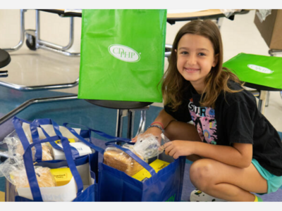 Albany Volunteers Fill Food Bags for Families